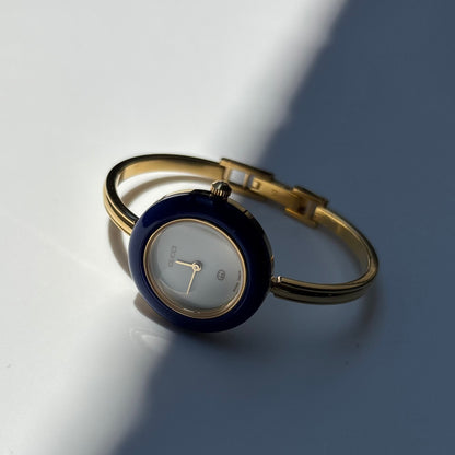 Gucci 1990s Interchangeable Bezel Gold Plated Bangle Watch with 12 bezels, case (Small)