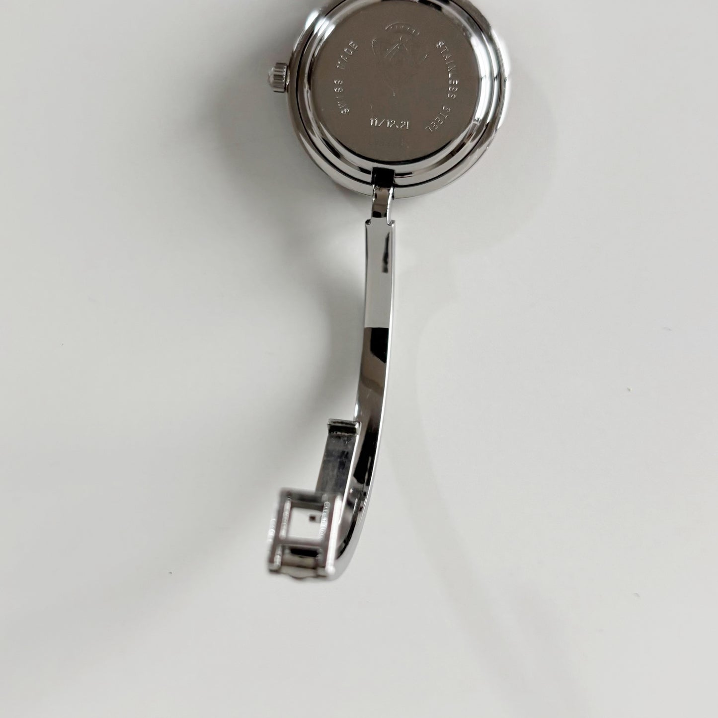 Gucci 1990s Interchangeable Bezel Stainless steel Bangle Watch with 12 bezels, case