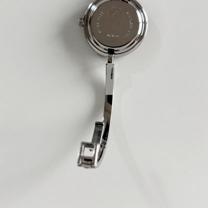 Gucci 1990s Interchangeable Bezel Stainless steel Bangle Watch with 12 bezels, case