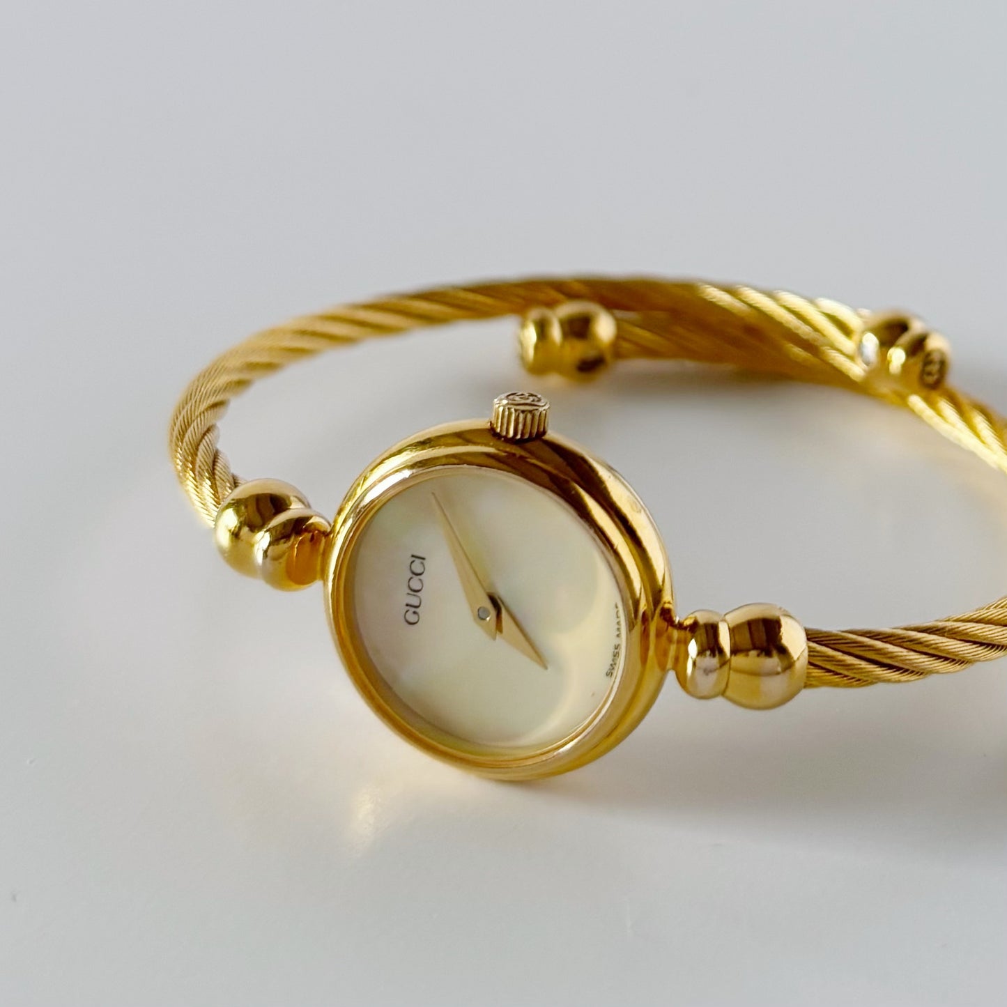 Gucci 1990s Seashell Dial Gold Plated Cable Bangle Watch