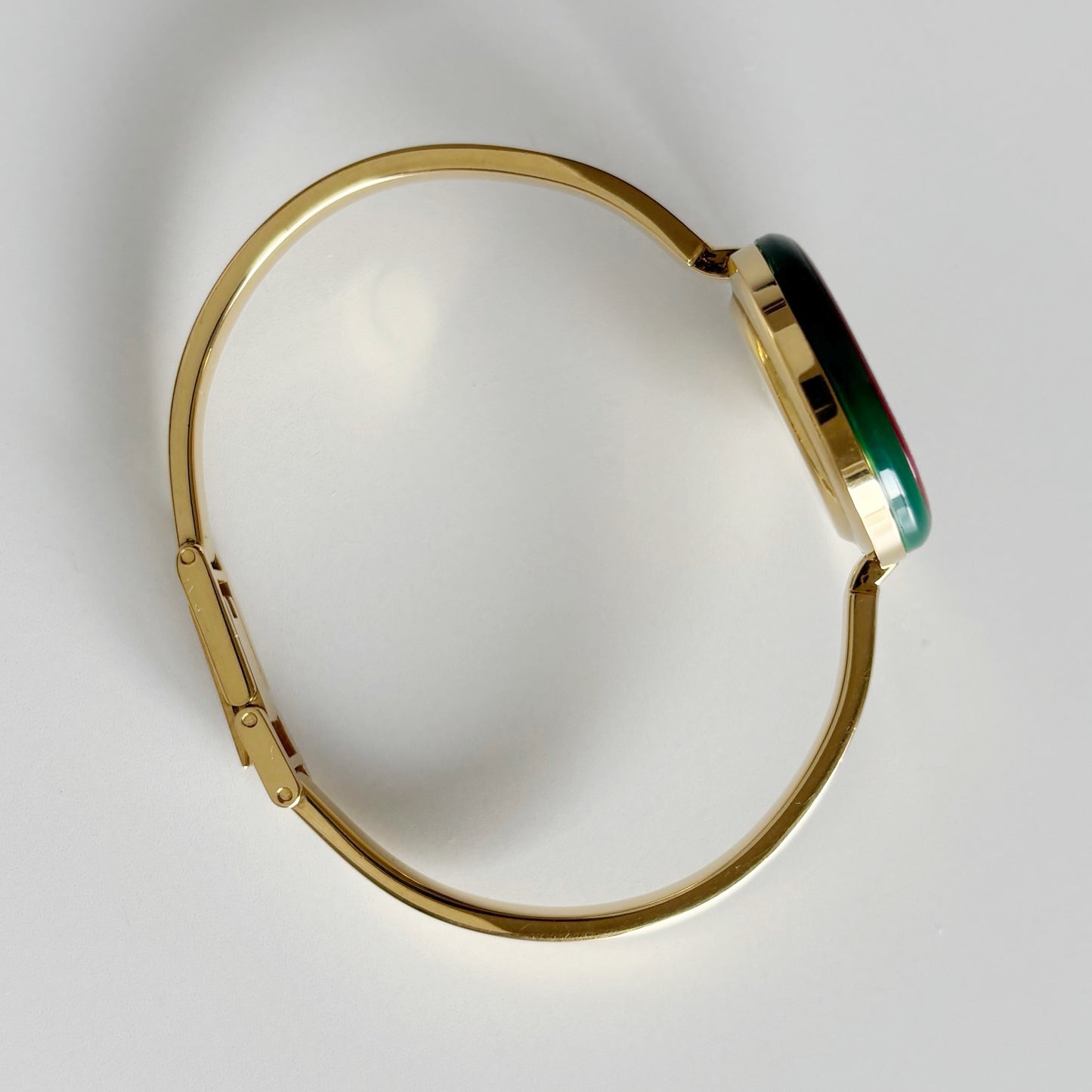 Gucci 1990s Interchangeable Bezel Gold Plated Bangle Watch with 12 bezels, case