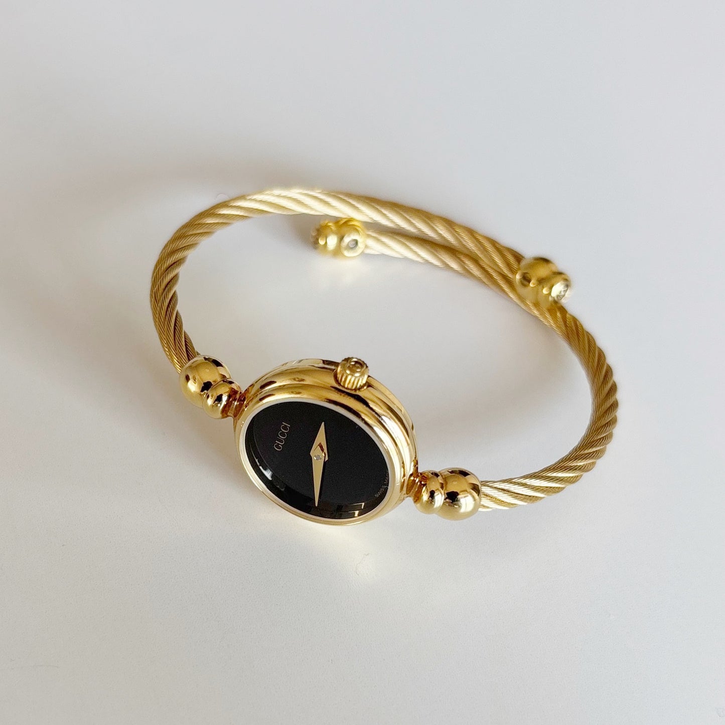 Gucci 1990s Black Dial Gold Plated Cable Bangle Watch