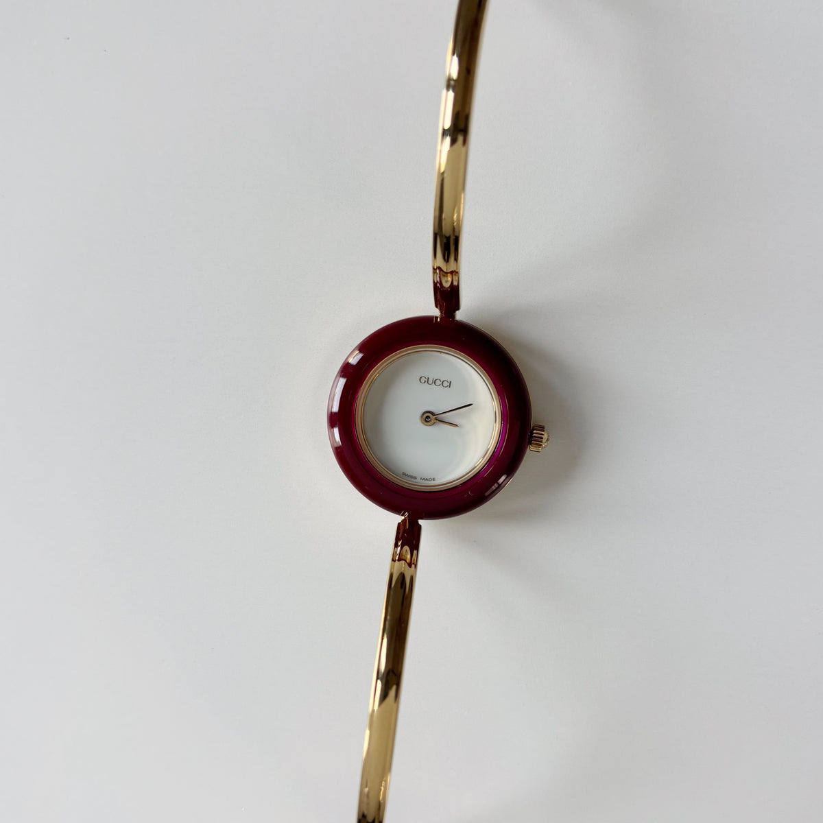 Gucci 1990s Interchangeable Bezel Gold Plated Bangle Watch with 12 bezels, case