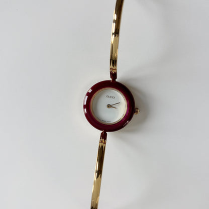 Gucci 1990s Interchangeable Bezel Gold Plated Bangle Watch with 12 bezels, case