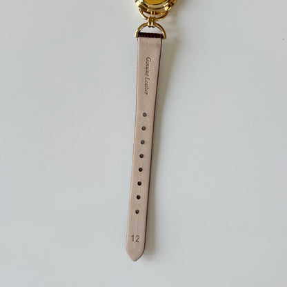 Gucci 1990s Round Cream Dial Horsebit Gold Plated Watch