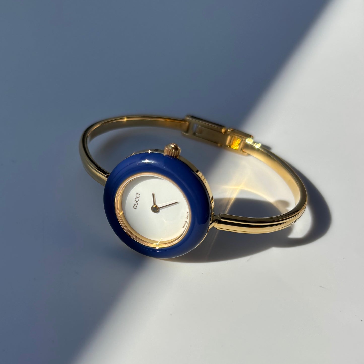 Gucci 1990s Interchangeable Bezel Gold Plated Bangle Watch with 12 bezels, case