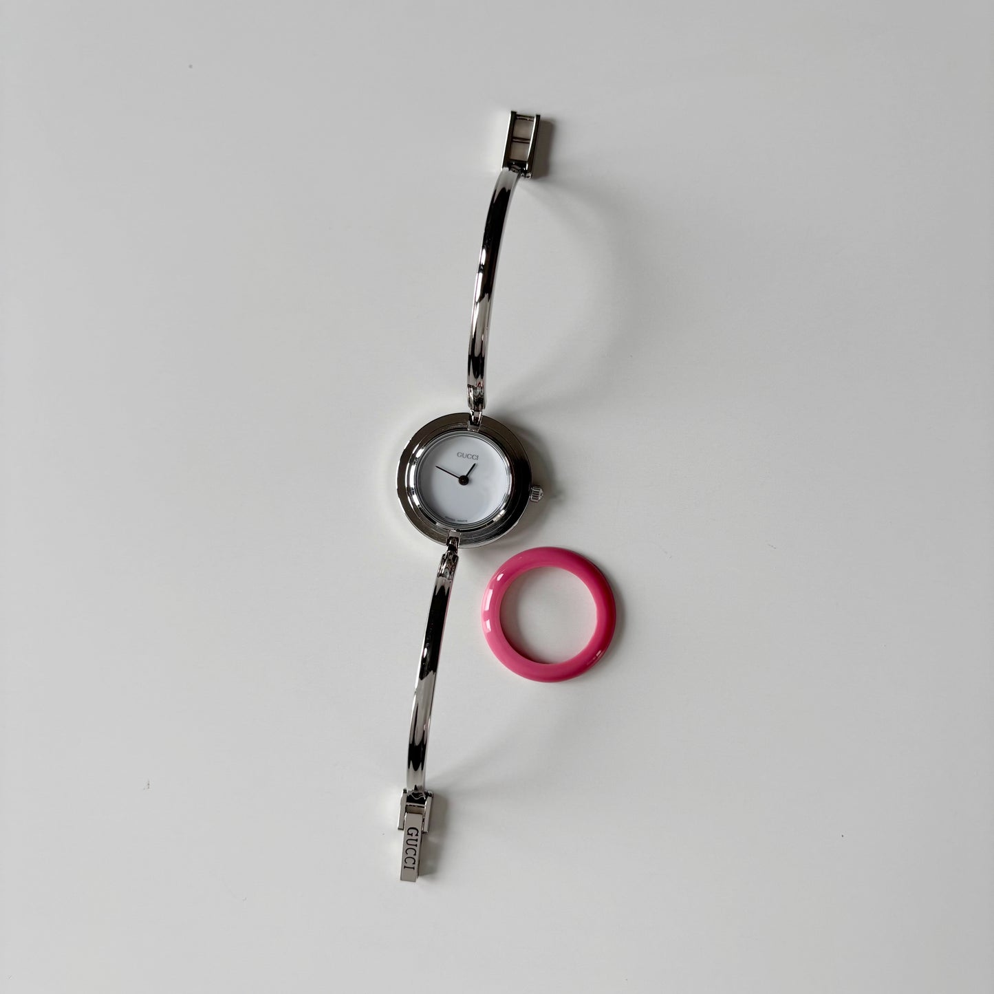 Gucci 1990s Interchangeable Bezel Stainless steel Bangle Watch with case, 12 bezels