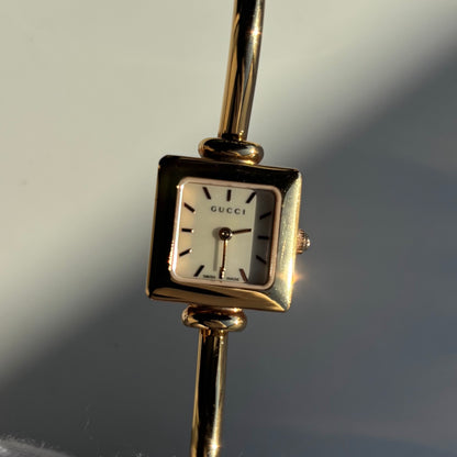 Gucci 1990s Seashell Square Dial Gold Plated Bangle Watch