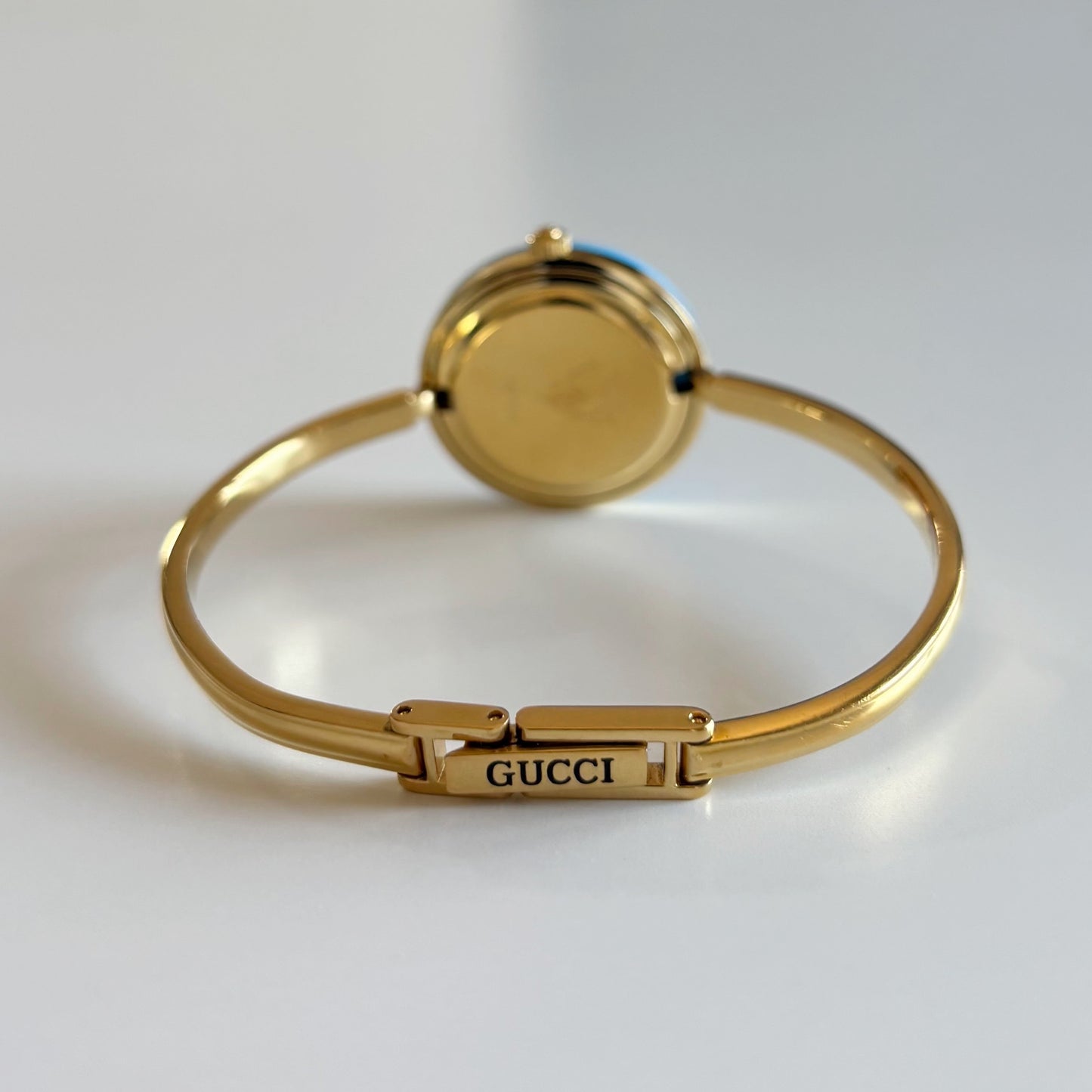Gucci 1990s Interchangeable Bezel Gold Plated Bangle Watch with 12 bezels, case