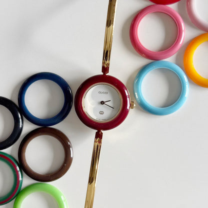 Gucci 1990s Interchangeable Bezel Gold Plated Bangle Watch with 12 bezels, case