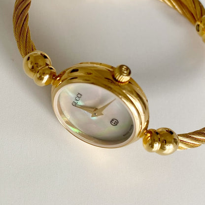 Gucci 1990s Seashell Dial Gold Plated Cable Bangle Watch