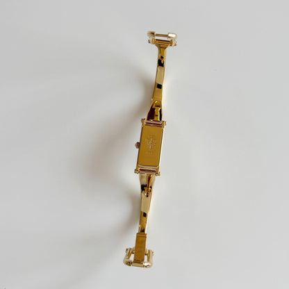 Gucci 1990s Seashell Rectangular Dial Gold Plated Bangle Watch