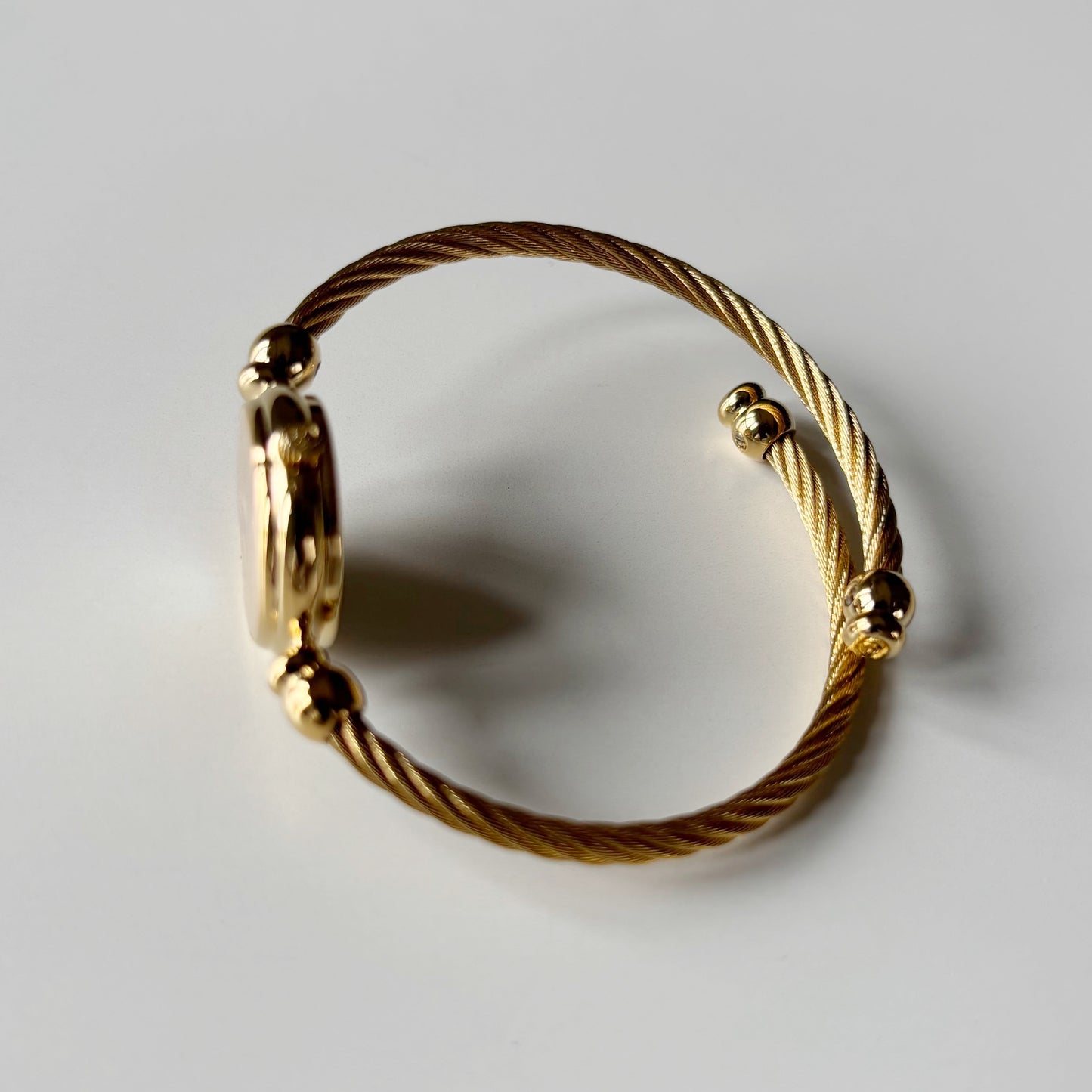 Gucci 1990s Seashell Dial Gold Plated Cable Band Bangle Watch