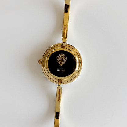 Gucci 1990s Interchangeable Bezel Gold Plated Bangle Watch with 12 bezels, case