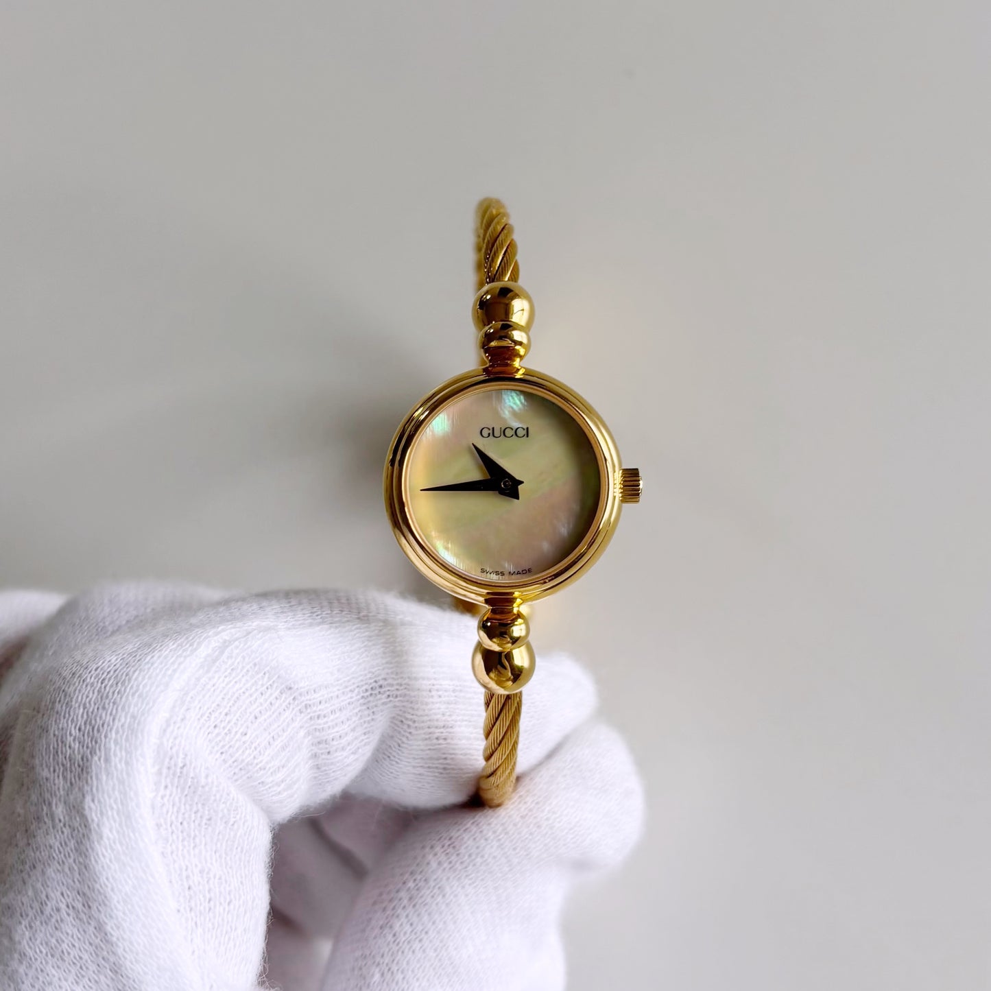Gucci 1990s Seashell Dial Gold Plated Cable Band Bangle Watch