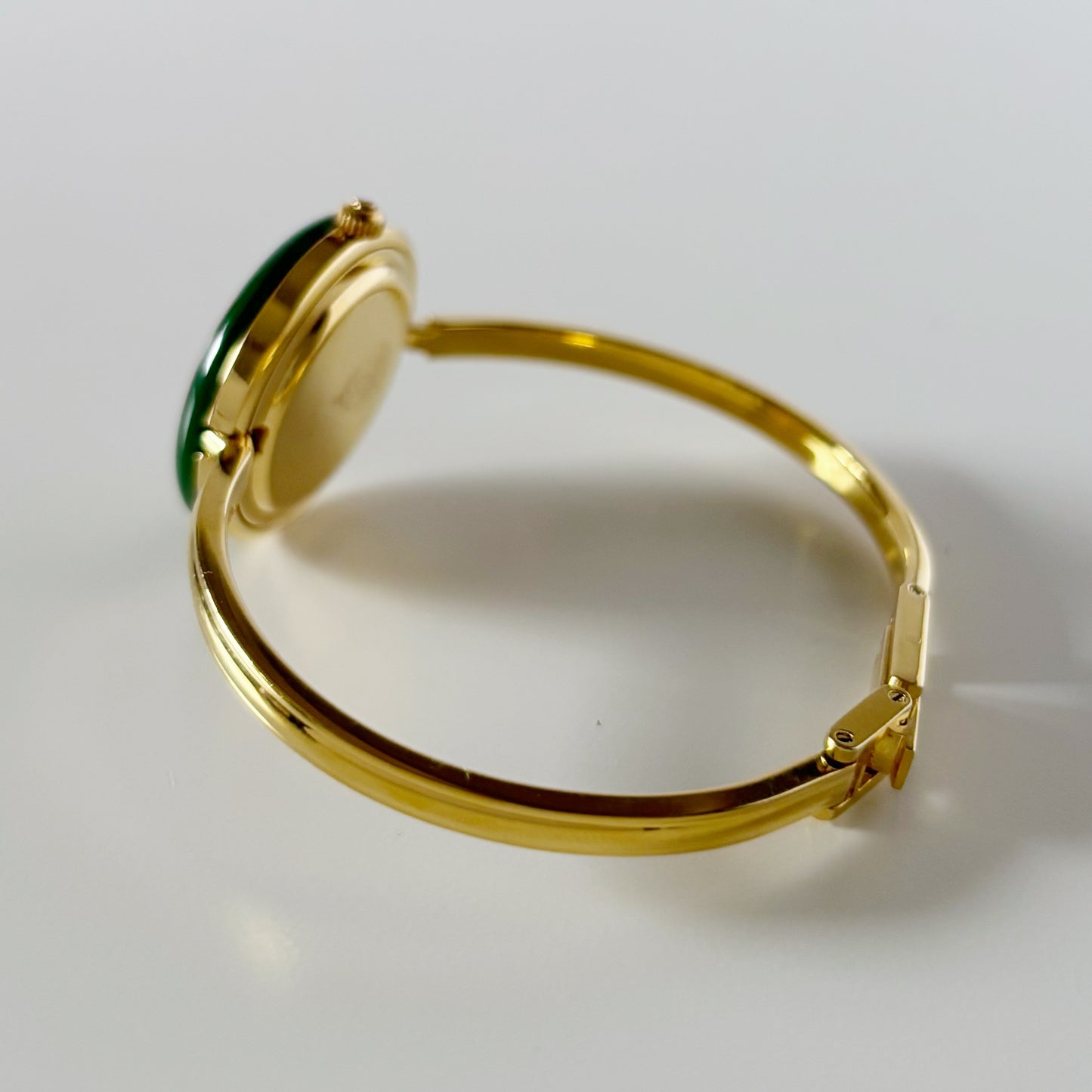 Gucci 1990s Interchangeable Bezel Gold Plated Bangle Watch with 12 bezels, case