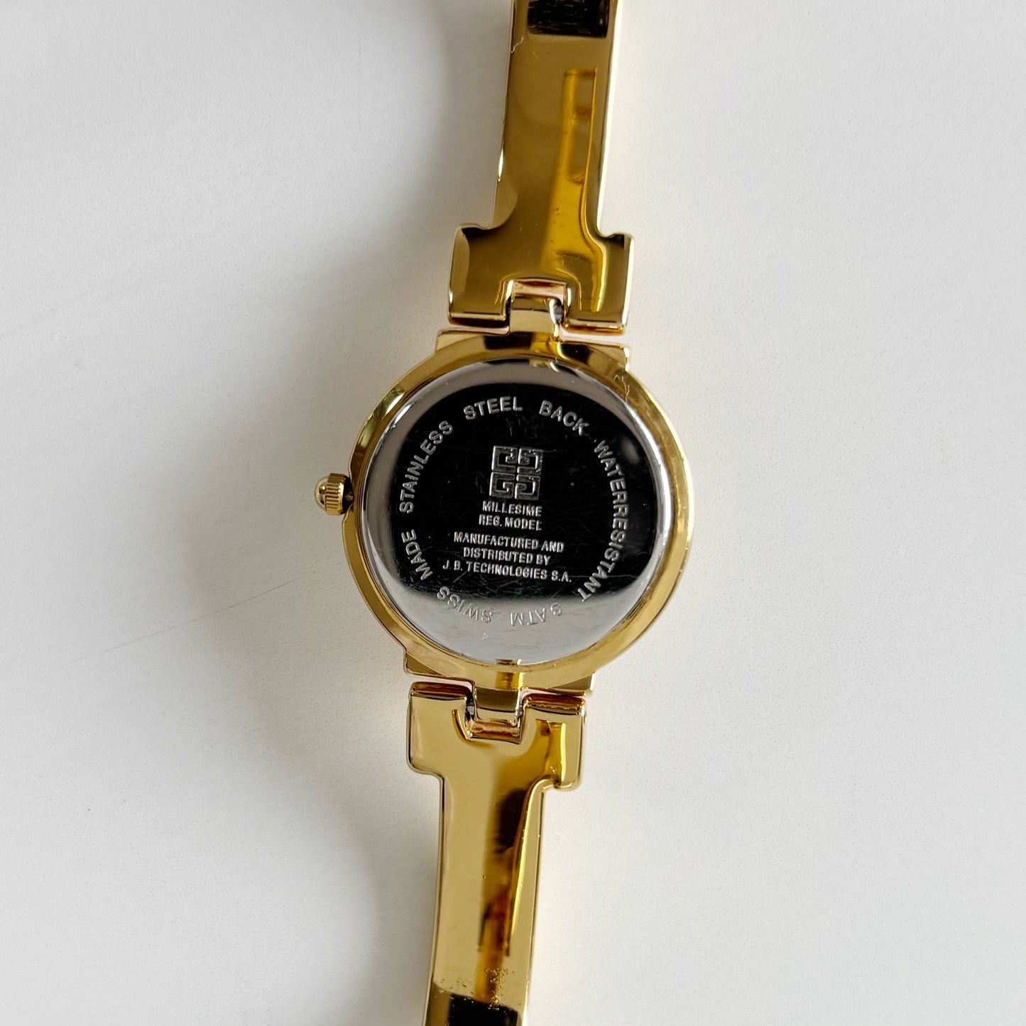 Givenchy 1990s Round Dial Gold Plated Bangle Watch