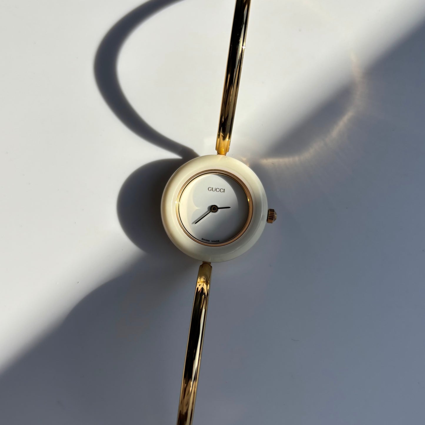 Gucci 1990s Interchangeable Bezel Gold Plated Bangle Watch with 12 bezels, case