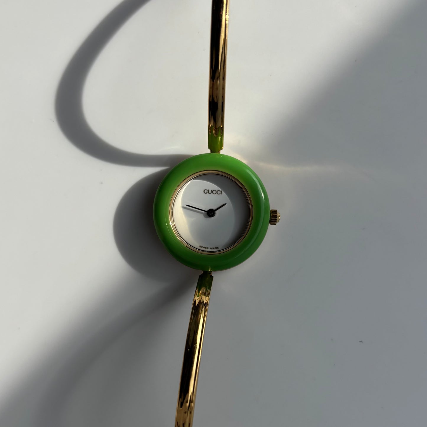 Gucci 1990sInterchangeable Bezel Gold Plated Bangle Watch with 12 bezels, case