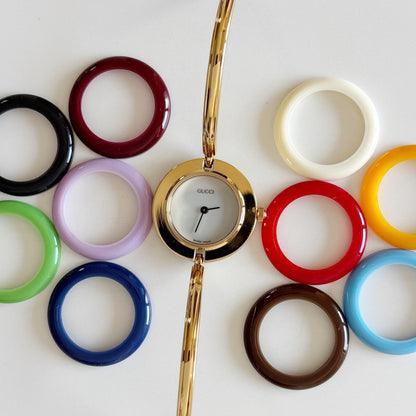 Gucci 1990s Interchangeable Bezel Gold Plated Bangle Watch with 12 bezels, case