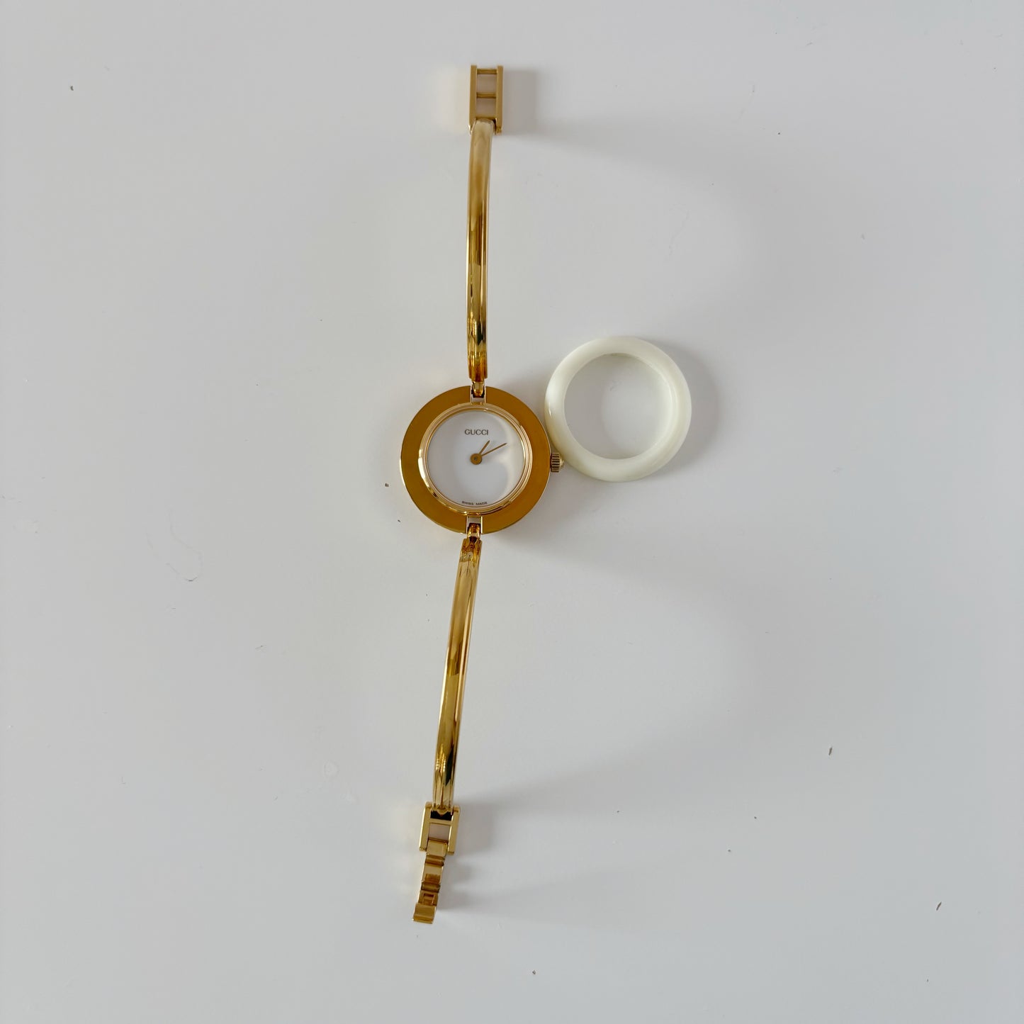 Gucci 1990s Interchangeable Bezel Gold Plated Bangle Watch with 12 bezels, case