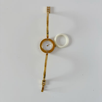 Gucci 1990s Interchangeable Bezel Gold Plated Bangle Watch with 12 bezels, case