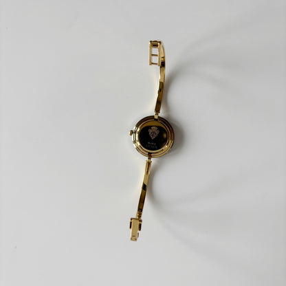 Gucci 1990s Interchangeable Bezel Gold Plated Bangle Watch with 12 bezels, case