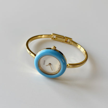 Gucci 1990s Interchangeable Bezel Gold Plated Bangle Watch with 12 bezels, case (Small)