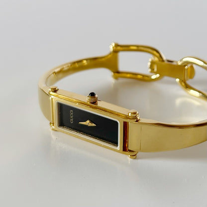 Gucci 1990s Black Dial Gold Plated Bangle Watch