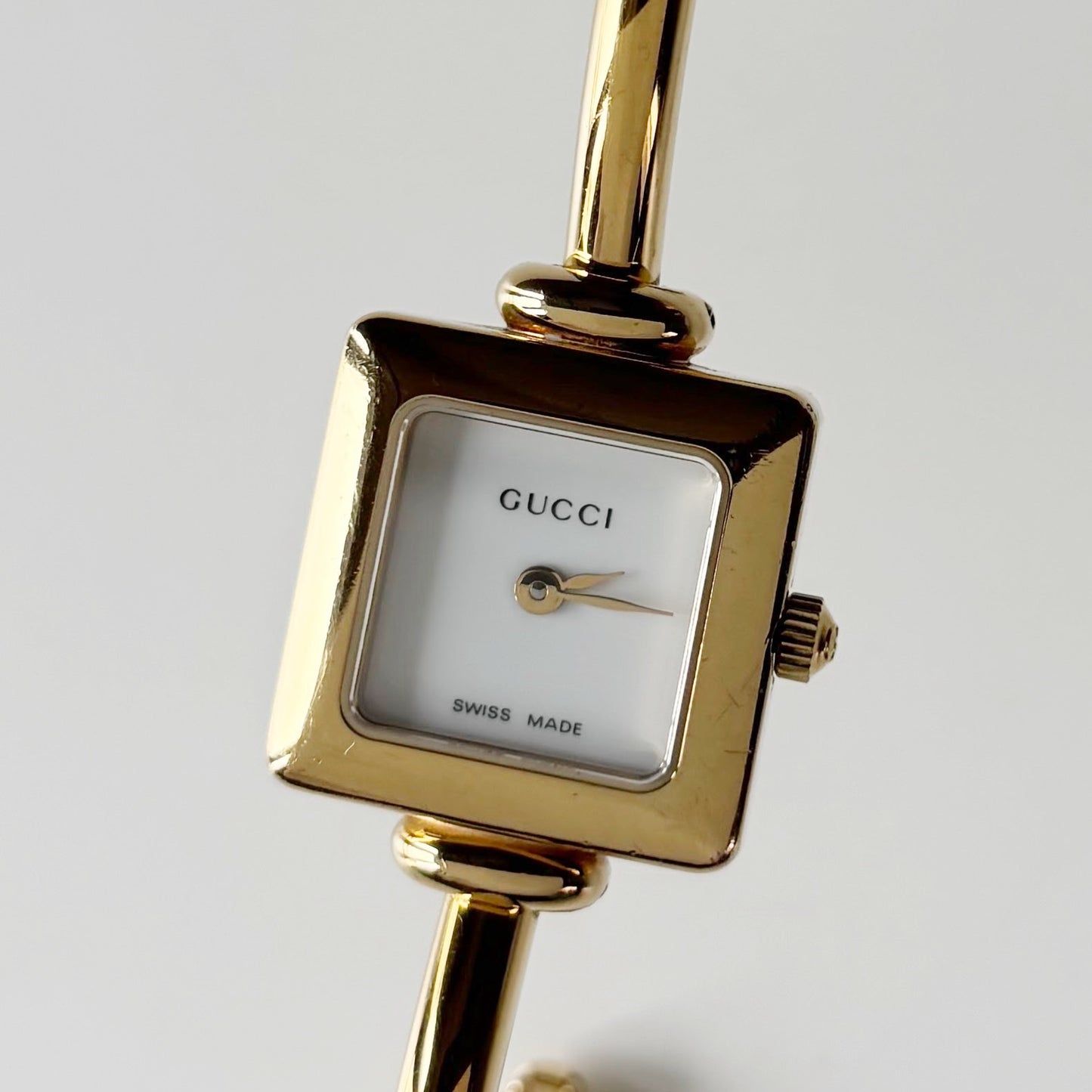 Gucci 1990s Square Dial Gold Plated Bangle Watch
