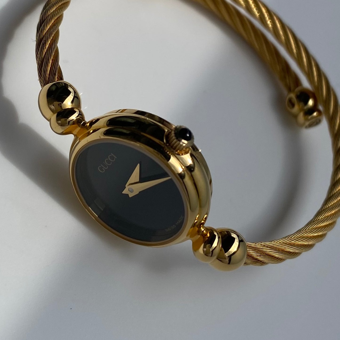 Gucci 1990s Black Dial Gold Plated Cable Bangle Watch
