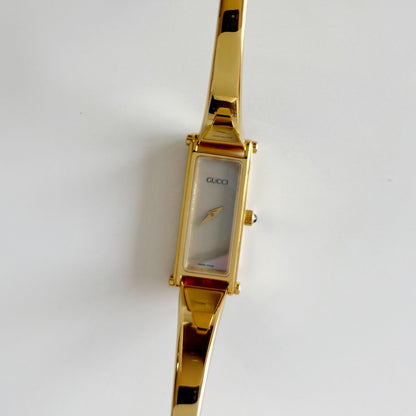 Gucci 1990s Seashell Dial Rectangular Gold Plated Bangle Watch