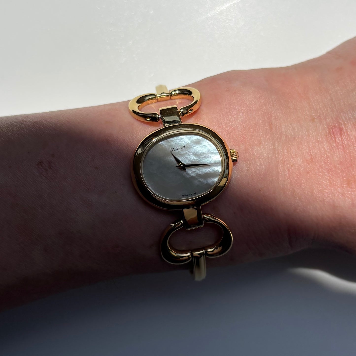Gucci 1990s Seashell Oval Dial Gold Plated Bangle Watch (Small)