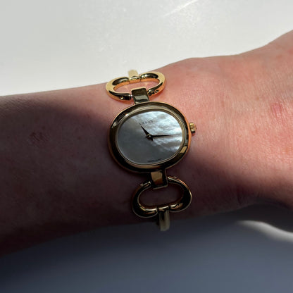 Gucci 1990s Seashell Oval Dial Gold Plated Bangle Watch (Small)