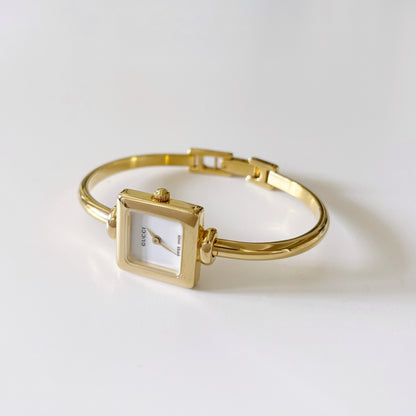 Gucci 1990s Square Dial Gold Plated Bangle Watch