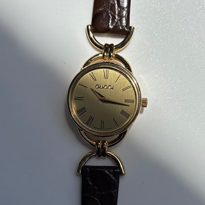Gucci 1990s Gold Round Dial Horsebit Gold Plated Watch