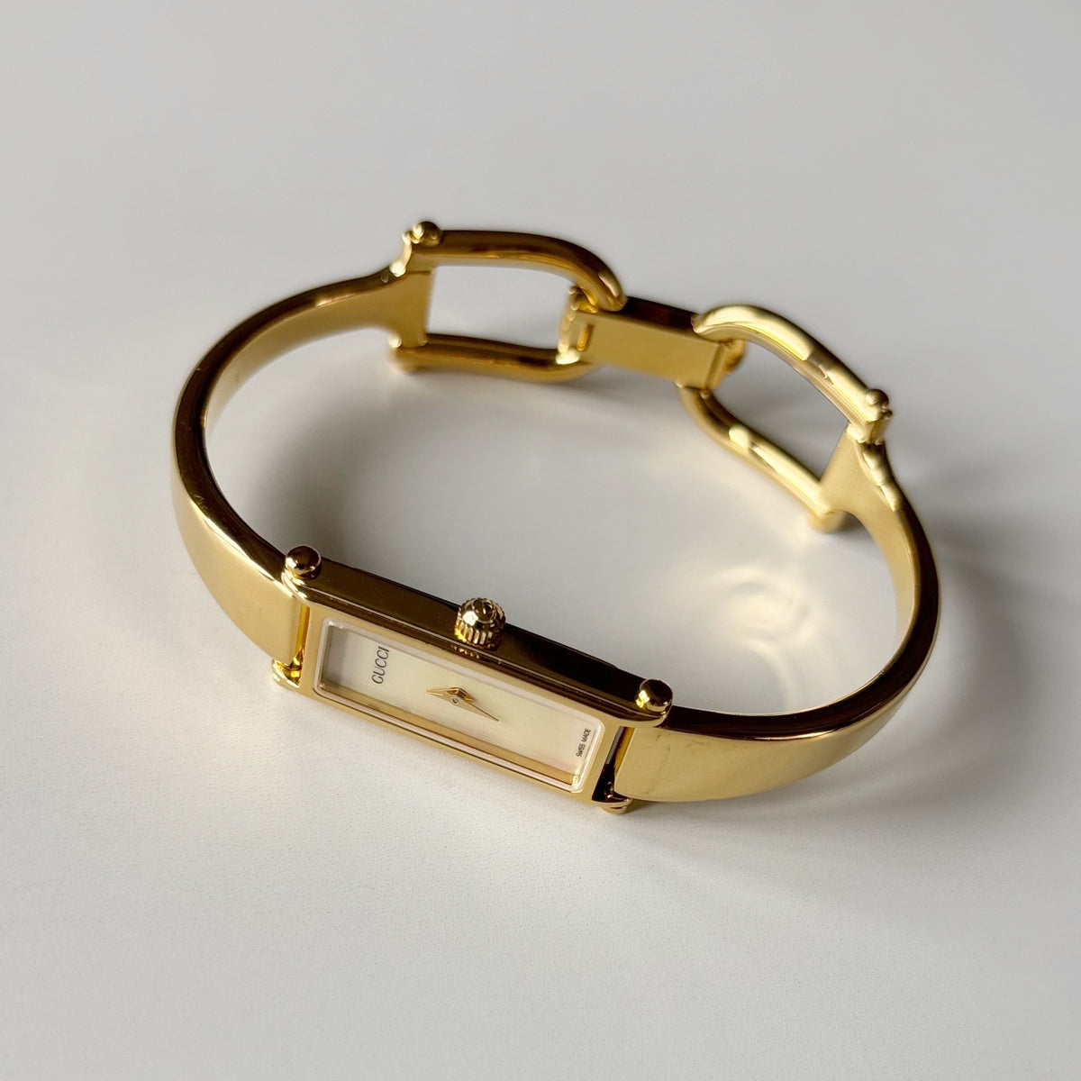 Gucci 1990s Seashell Rectangular Dial Gold Plated Bangle Watch