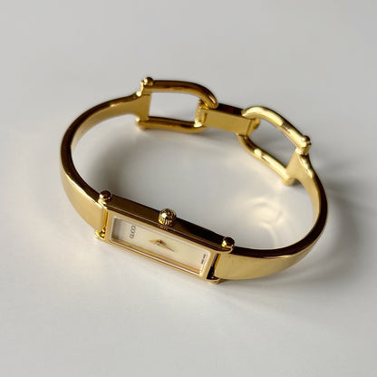 Gucci 1990s Seashell Rectangular Dial Gold Plated Bangle Watch