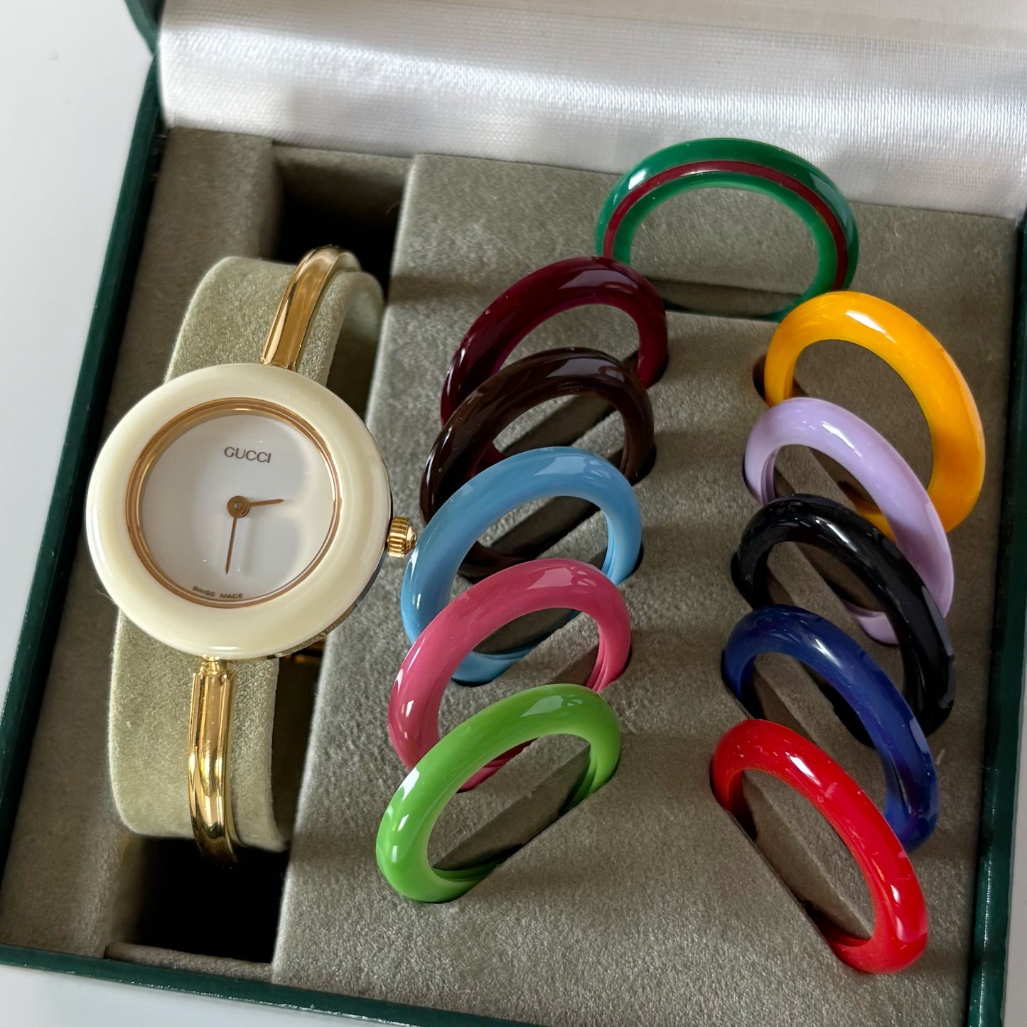 Gucci 1990s Interchangeable Bezel Gold Plated Bangle Watch with 12 bezels, case
