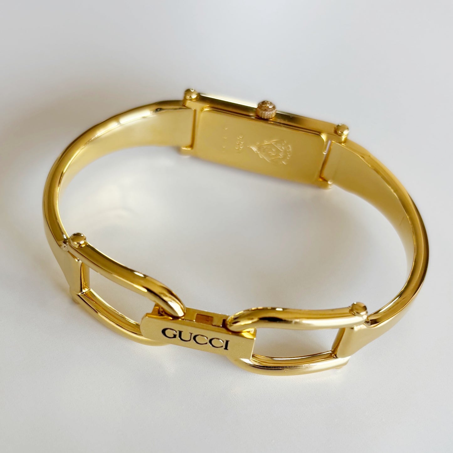 Gucci 1990s Black Rectangular Dial Gold Plated Bangle Watch