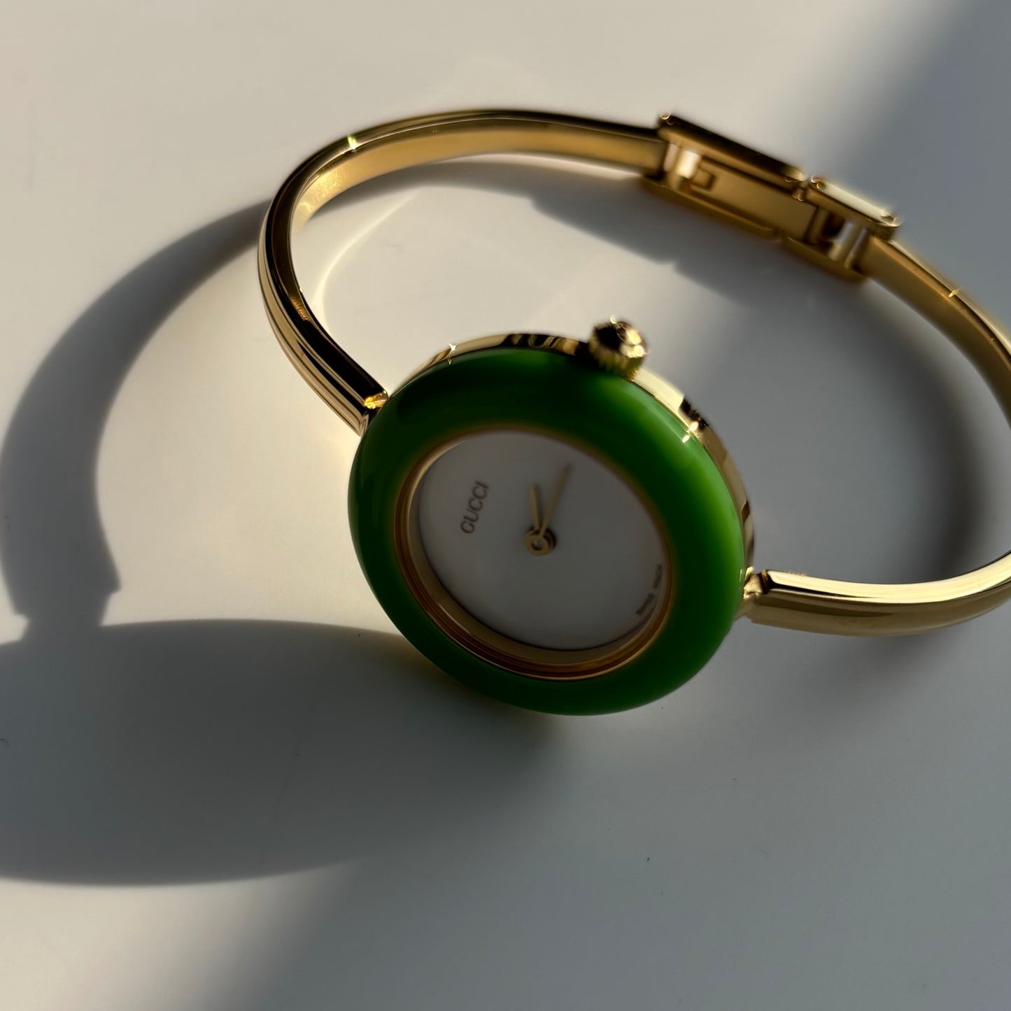 Gucci 1990s Interchangeable Bezel Gold Plated Bangle Watch with 12 bezels, case