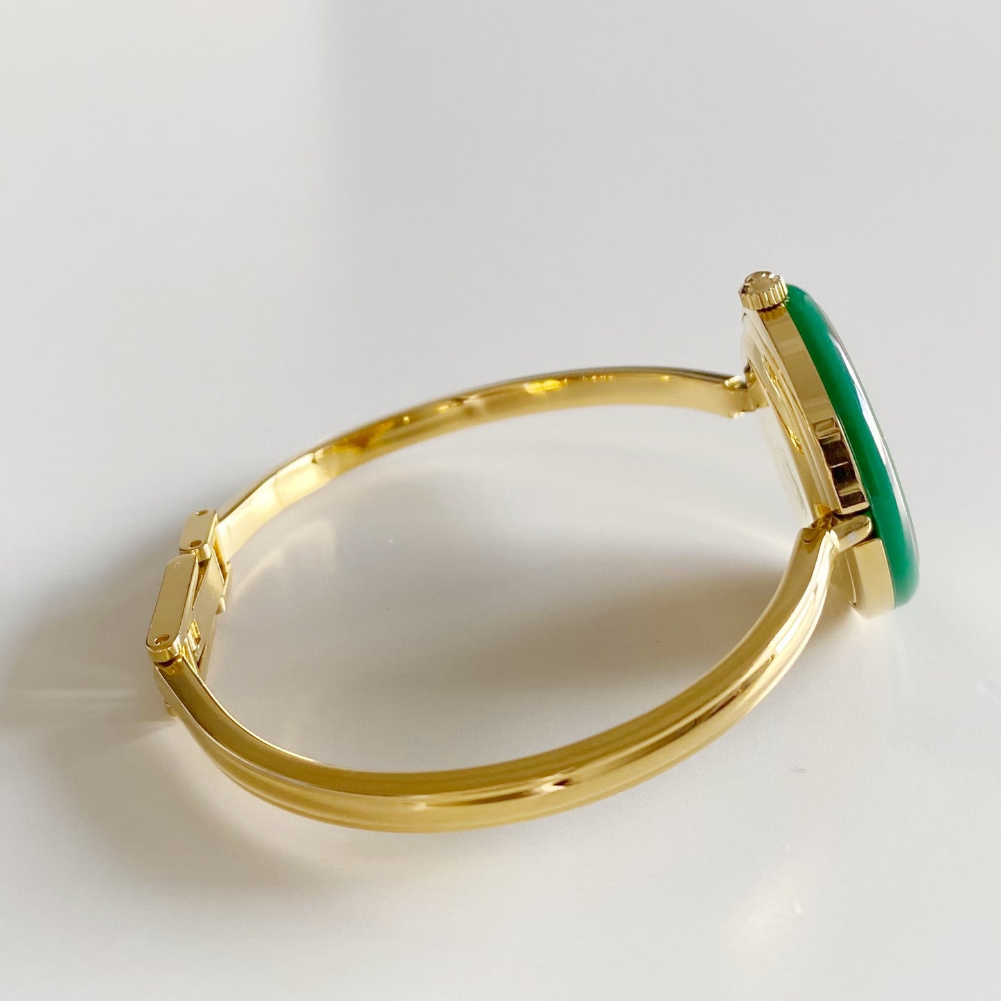 Gucci 1990s Interchangeable Bezel Gold Plated Bangle Watch with 12 bezels, case