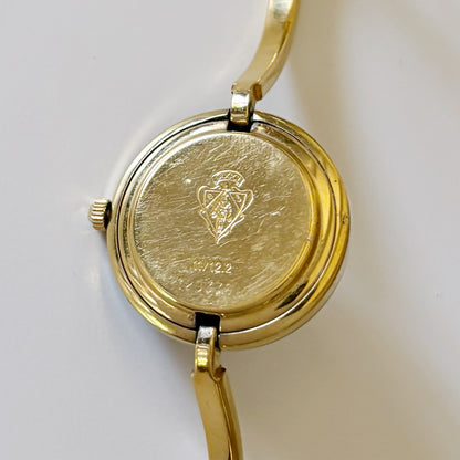 Gucci 1990s Interchangeable Bezel Gold Plated Bangle Watch with 1 bezel