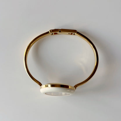 Gucci 1990s Interchangeable Bezel Gold Plated Bangle Watch with case, 12 bezels (Small)