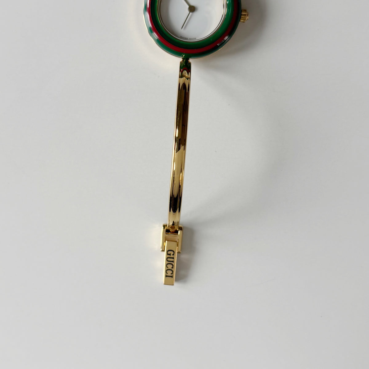 Gucci 1990s Interchangeable Bezel Gold Plated Bangle Watch with 12 bezels, case