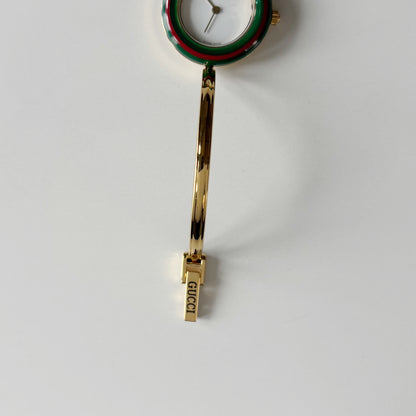 Gucci 1990s Interchangeable Bezel Gold Plated Bangle Watch with 12 bezels, case