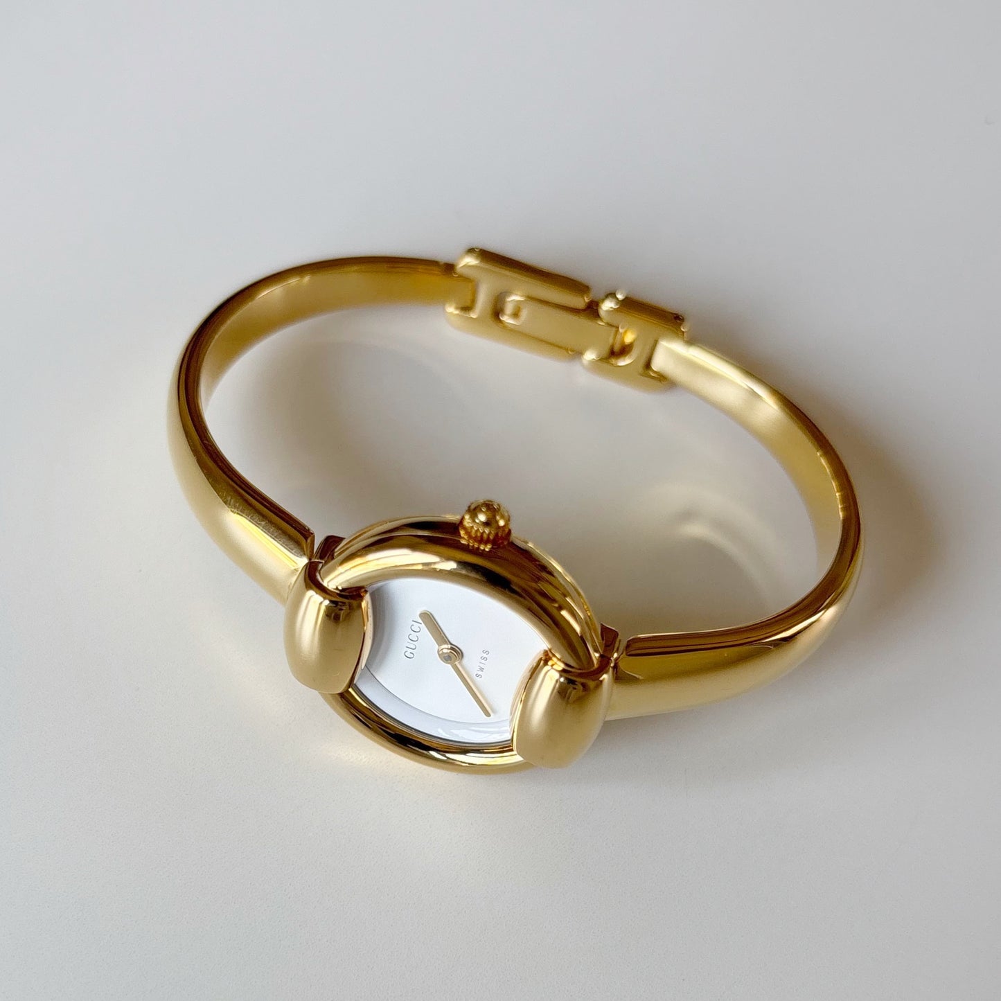 Gucci 1990s Round Dial Gold Plated Bangle Watch