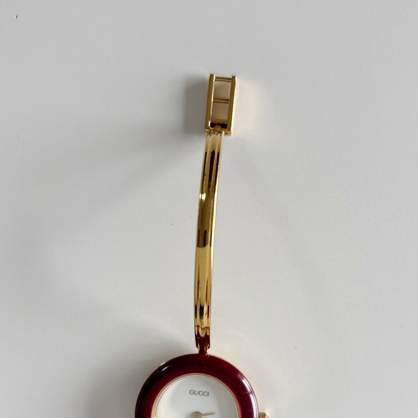 Gucci 1990s Interchangeable Bezel Gold Plated Bangle Watch with 12 bezels, case