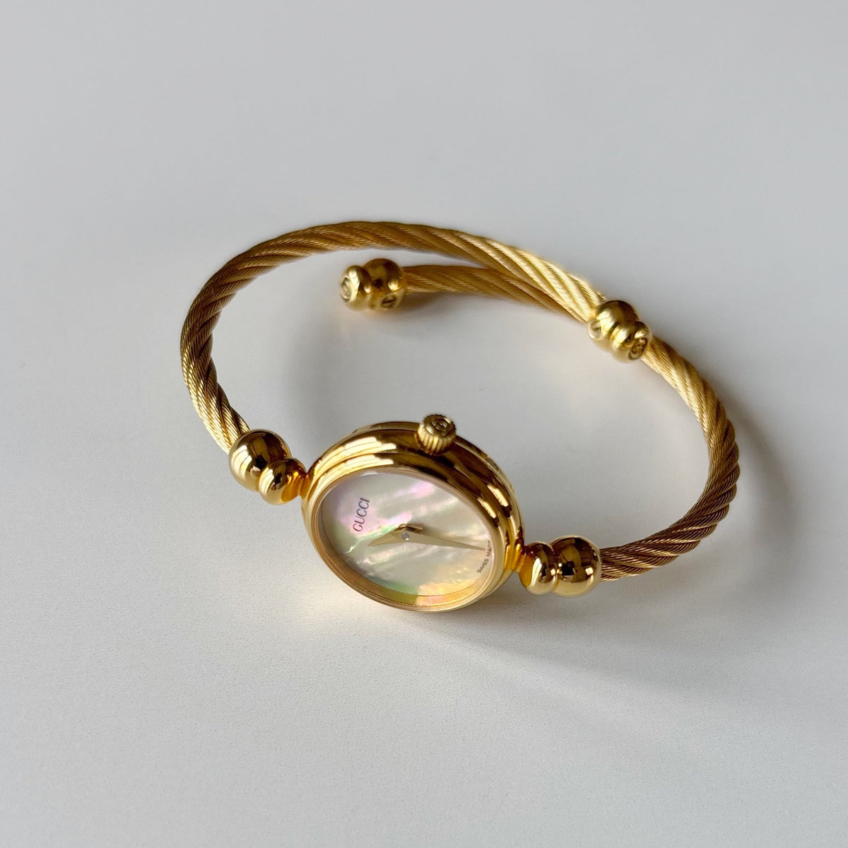 Gucci 1990s Seashell Dial Gold Plated Cable Bangle Watch