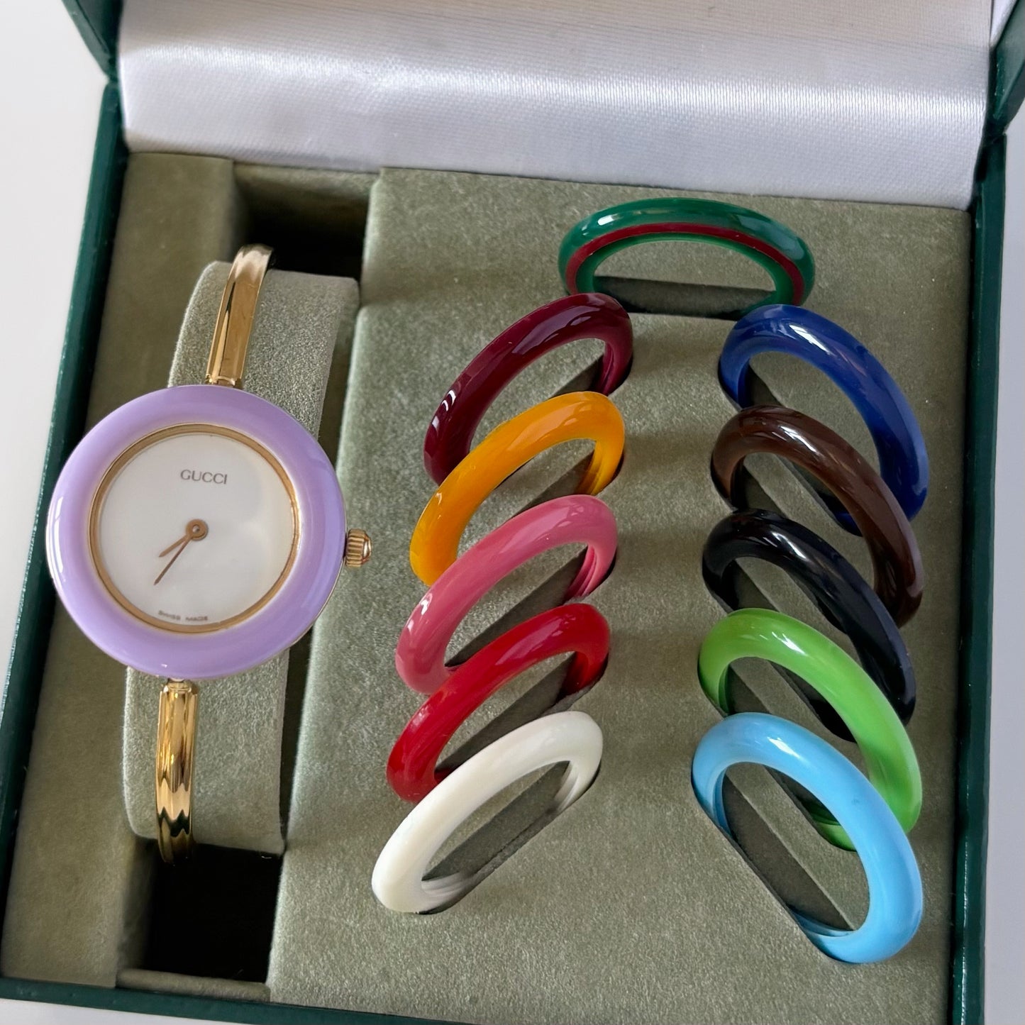 Gucci 1990s Interchangeable Bezel Gold Plated Bangle Watch with 12 bezels, case